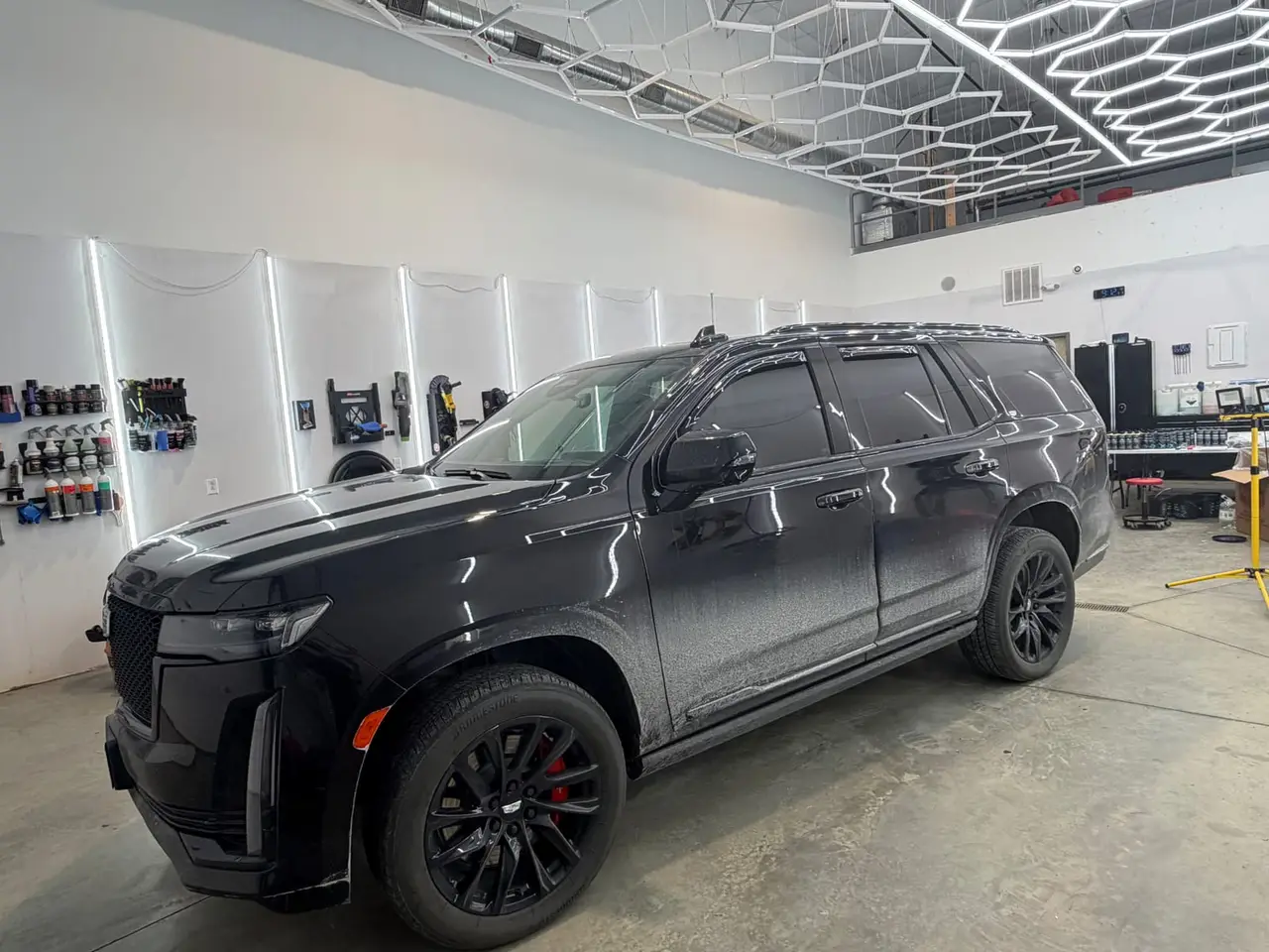 Before - Cadillac Escalade-V black exterior side before and after detailing Shrewsbury MA