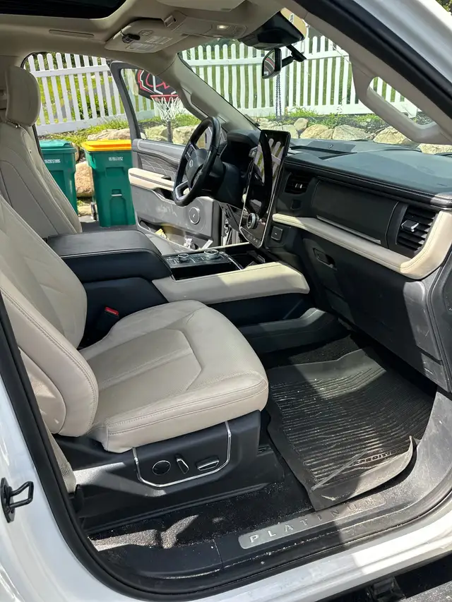 Before - Ford Expedition Platinum interior passenger side before and after detailing Shrewsbury MA