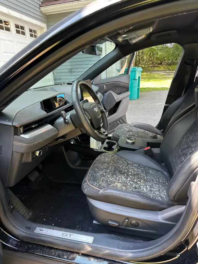 Before - Ford Mustang Mach-E interior front before and after detailing Shrewsbury MA