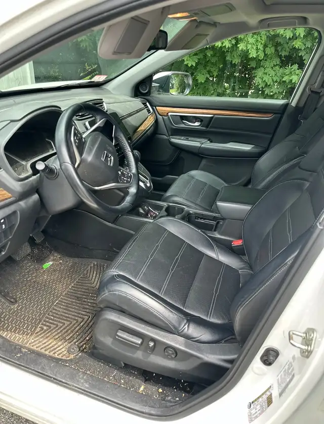 Before - Honda CR-V white interior driver seat before and after detailing Shrewsbury MA