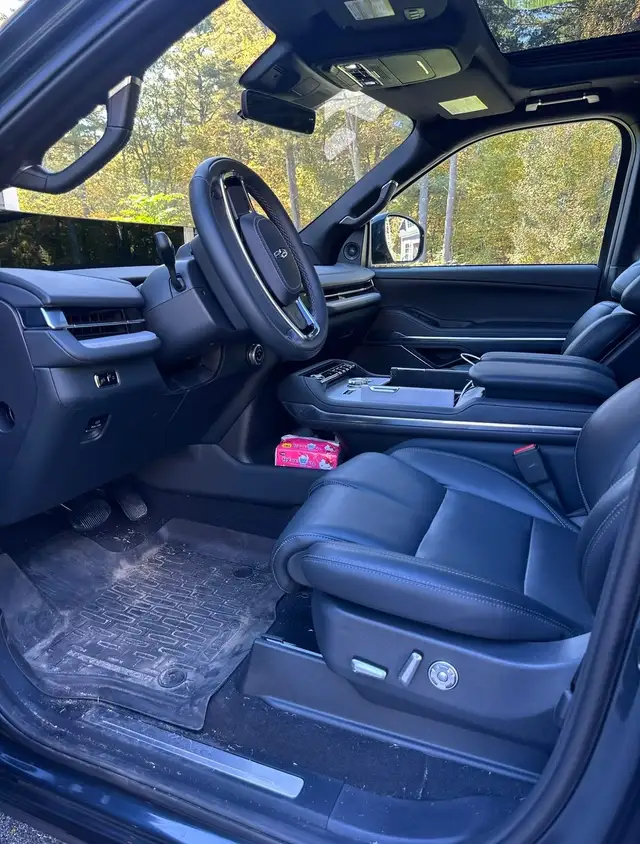 Before - Lincoln Navigator interior driver seat before and after detailing Shrewsbury MA