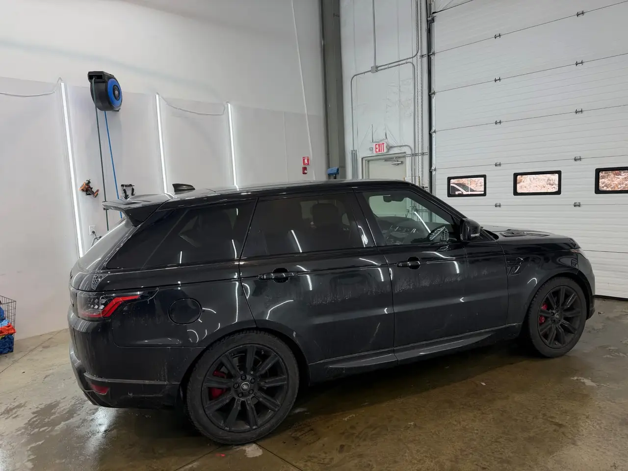 Before - Range Rover Sport SVR black exterior side before and after detailing Shrewsbury MA